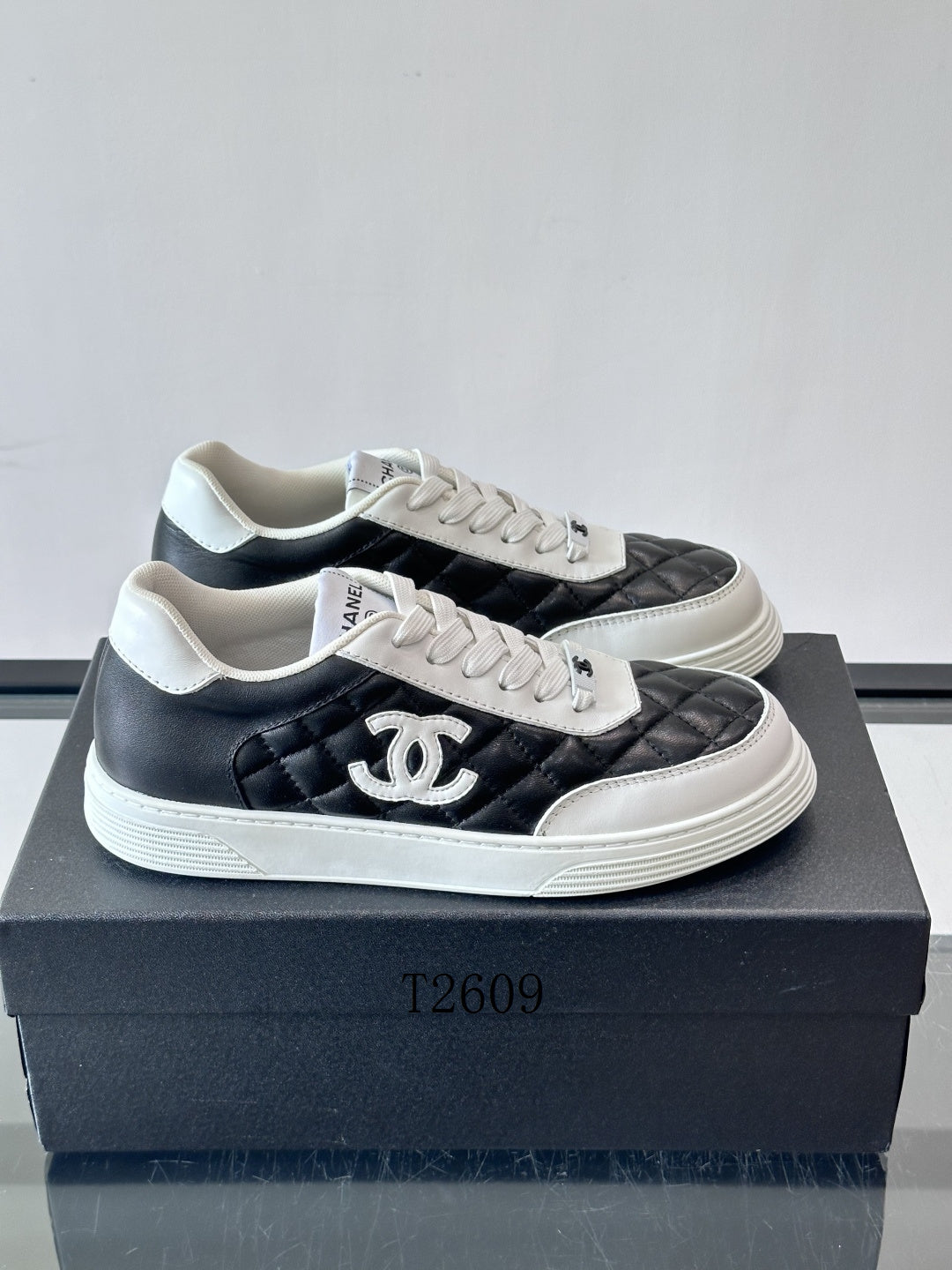 Chanel Black & White Quilted Panel Sneakers