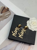 Saint Laurent Cassandre Crystal Drop Earrings in Gold