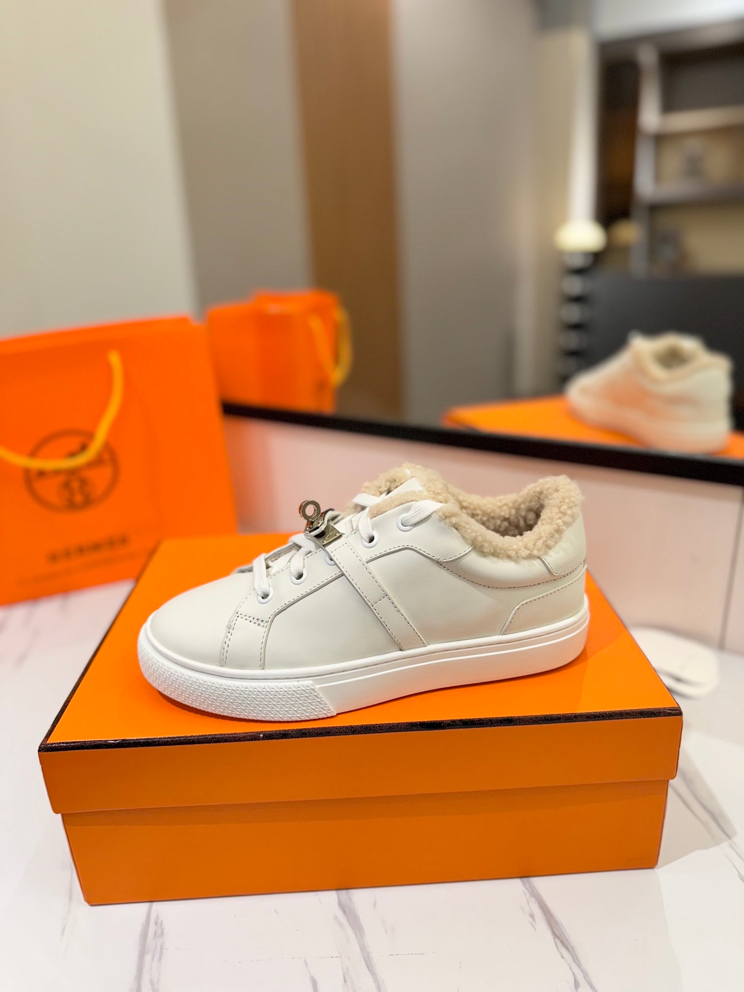 HERMES DAY SNEAKER IN WHITE CALFSKIN AND FLEECE LINING